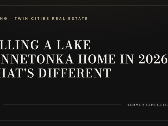 Aerial view of a luxury Lake Minnetonka lakefront home with private dock extending into calm water at golden hour