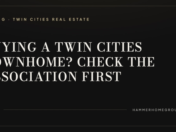Row of single-level association-maintained townhomes in a Twin Cities west metro neighborhood at dusk