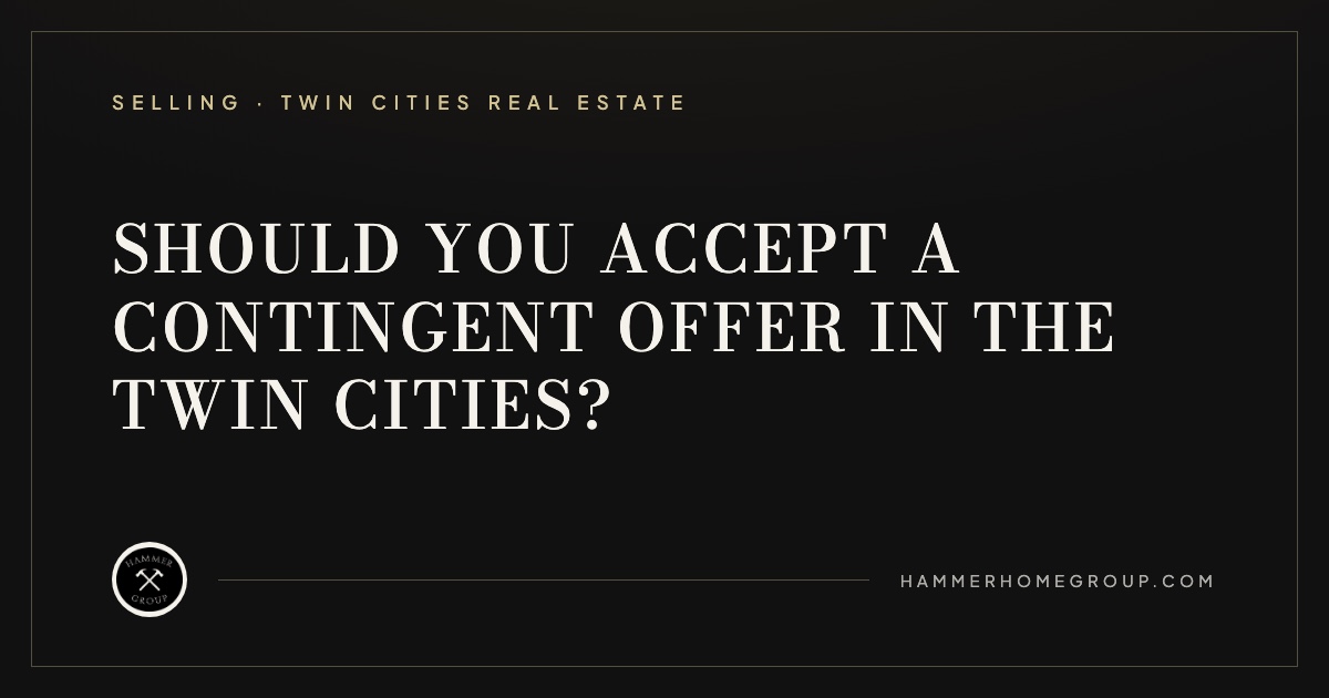 Two sets of house keys and a signed purchase agreement on a desk, illustrating a Twin Cities seller deciding whether to accept a contingent offer.